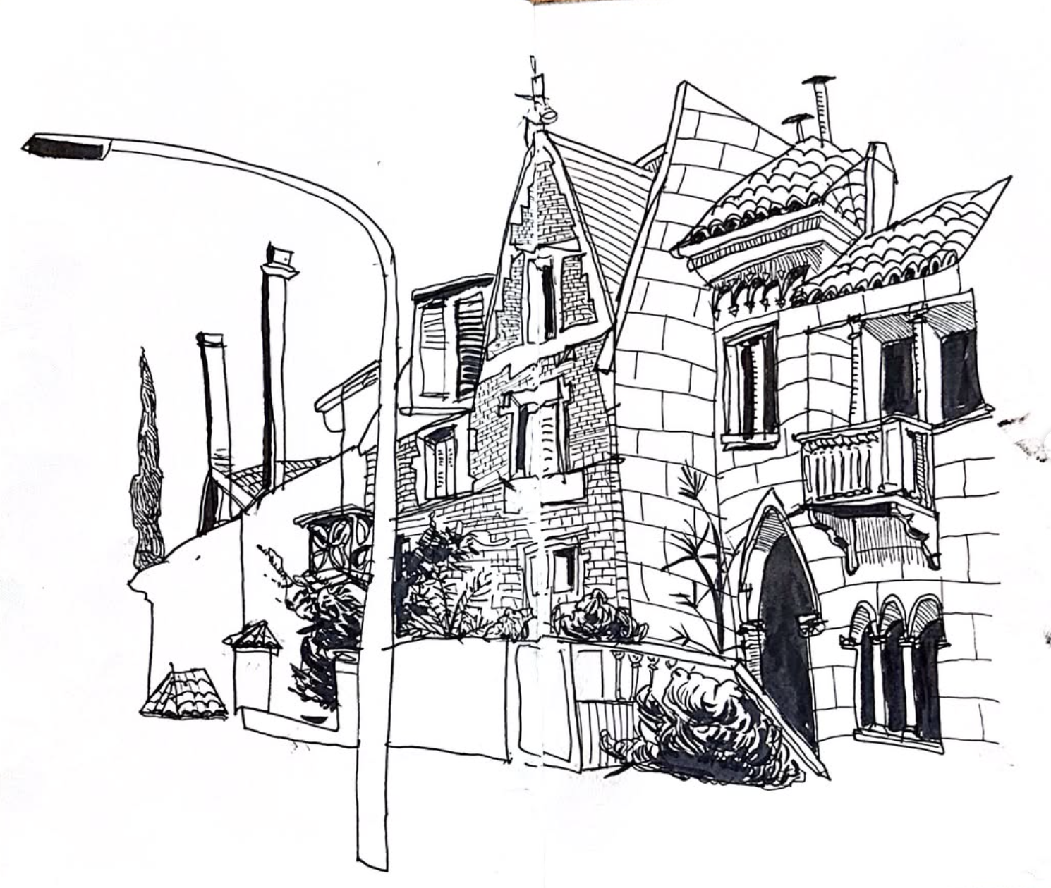 Croquis a tinta a doble página de una escena callejera con farola, fachadas con gabletes y vegetación.